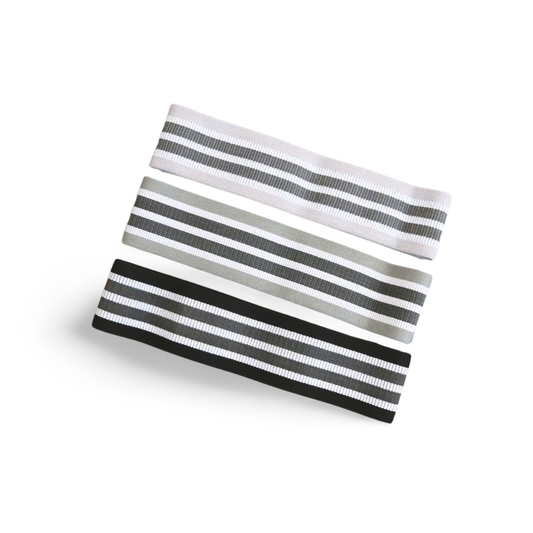 Black set fabric resistance bands on a white background