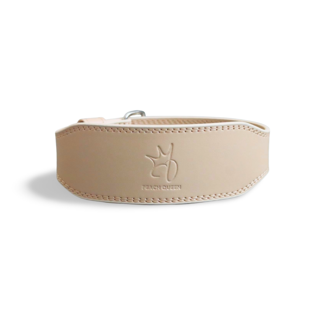 Nude weight lifting belt on a white background 
