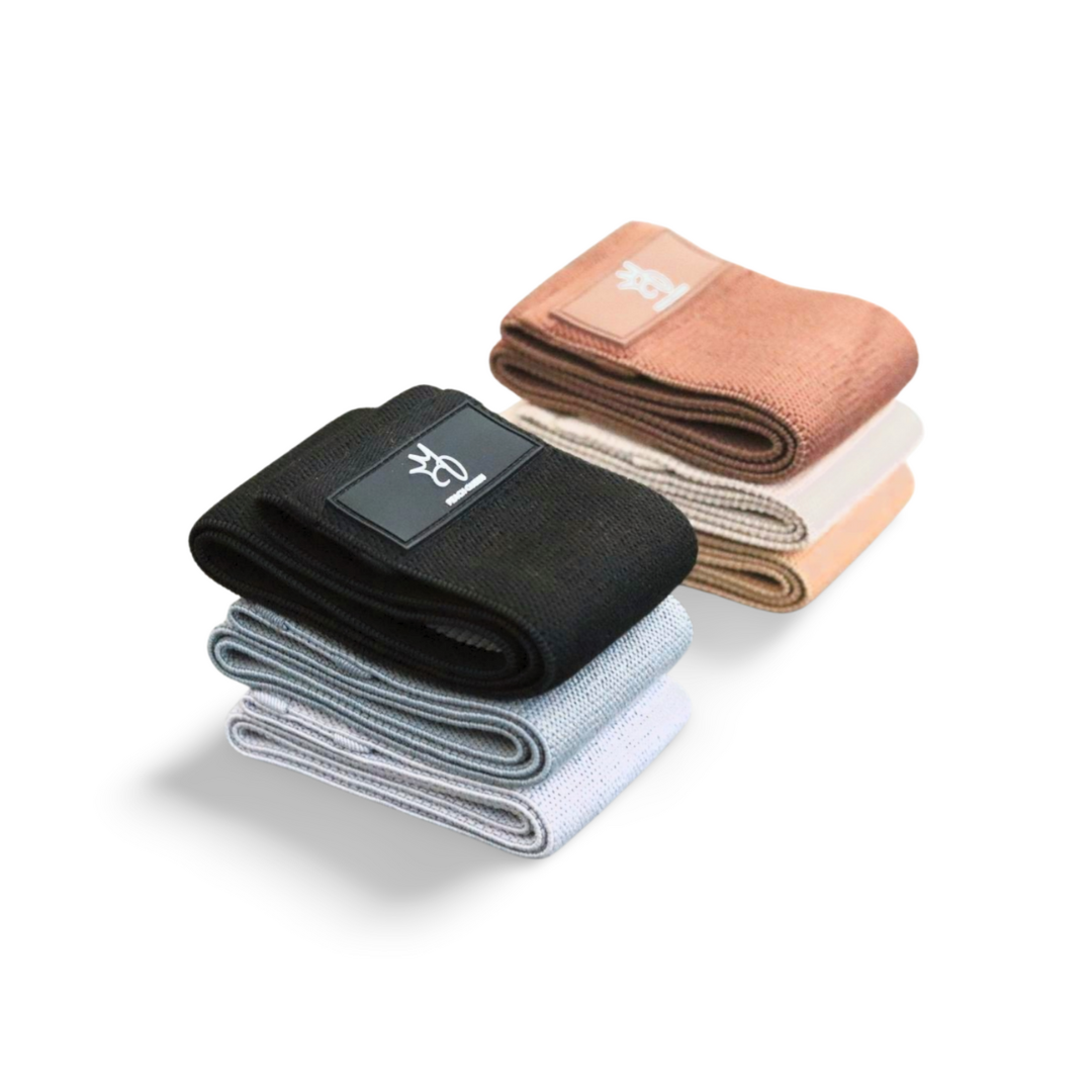 Set of folded fabric bands in black, gray, and beige on a white background