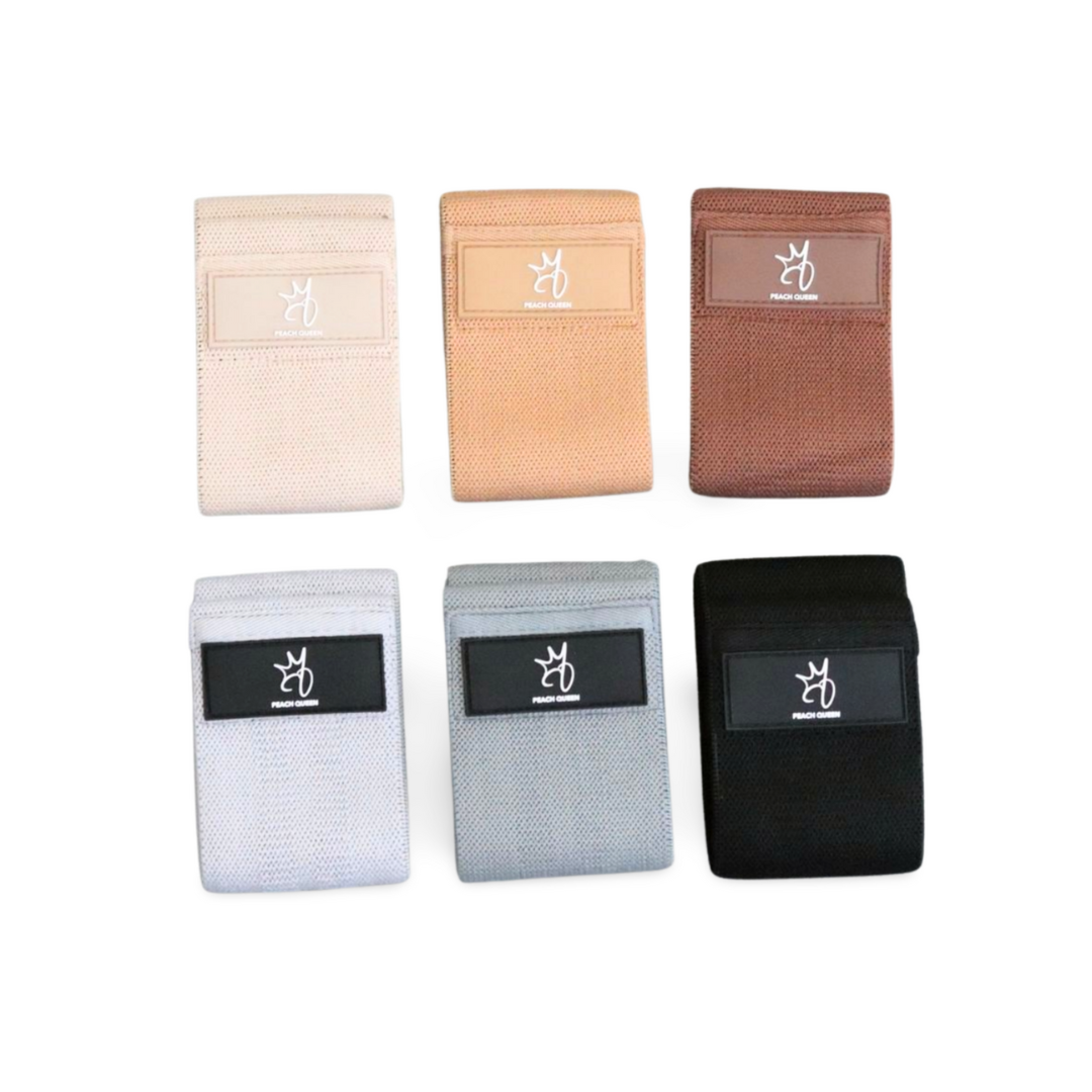 Black and brown set fabric resistance bands with a logo on a white background