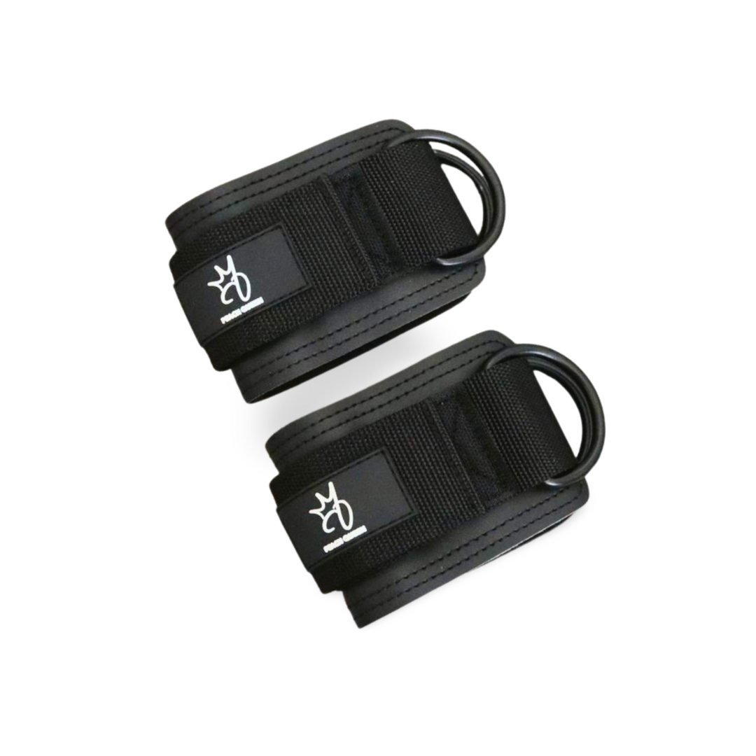 Two black ankle straps with a logo on a white background