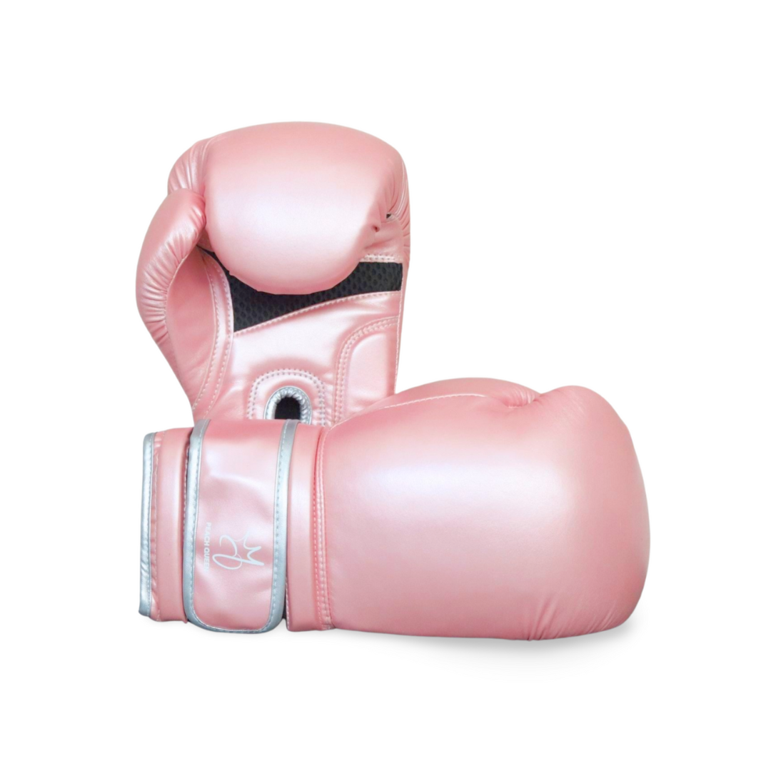 Pair of pink boxing gloves on a white background